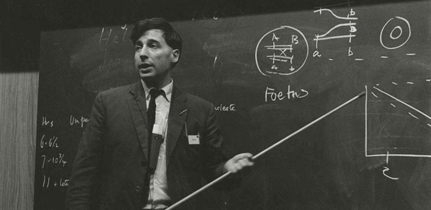 Bob Edwards giving a talk at a Berlin symposium